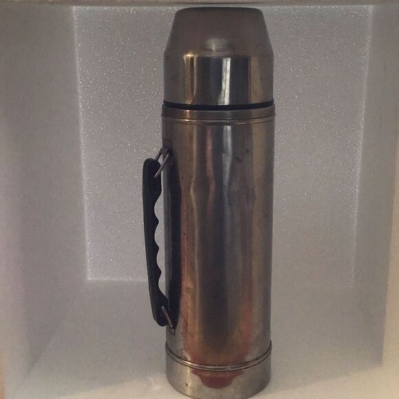Vintage Uno-vac stainless thermos with patina and a little ding - Picture 1 of 8